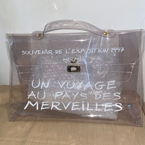 HERMES Vinyl Souvenir De L'Exposition Kelly Transparent